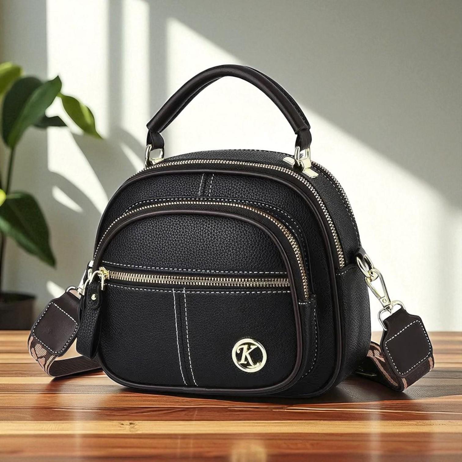 Ada · Borsa a mano