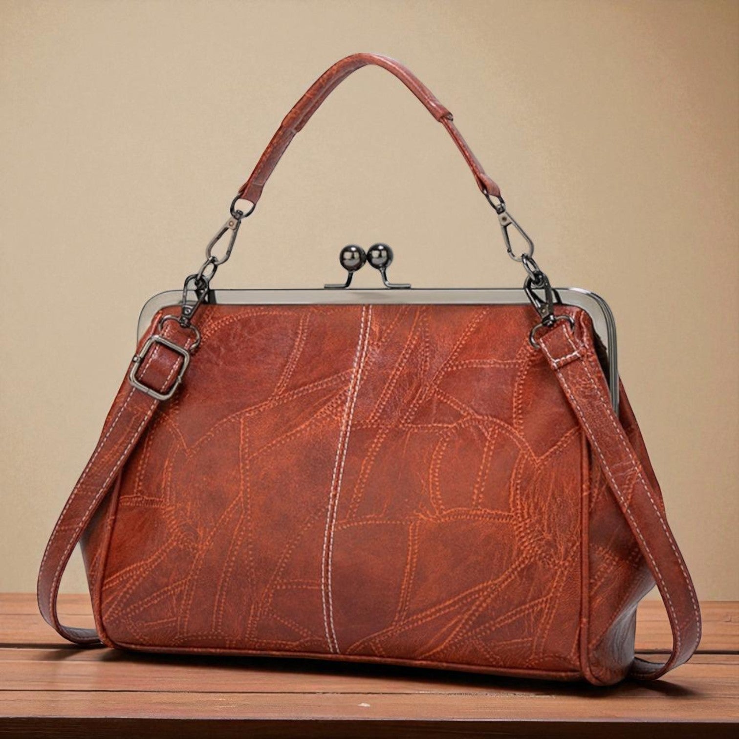 Diana · Borsa a mano con chiusura a scatto