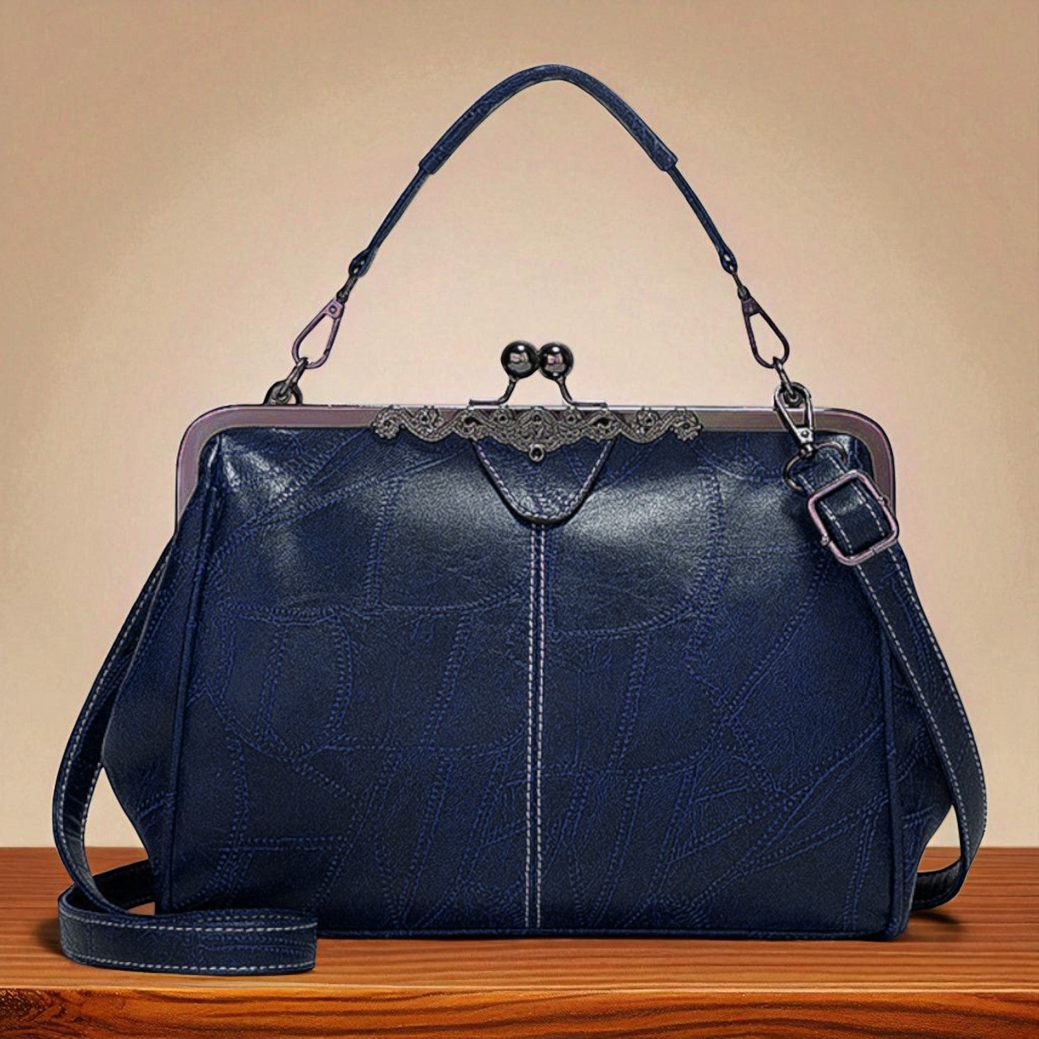 Diana · Borsa a mano con chiusura a scatto