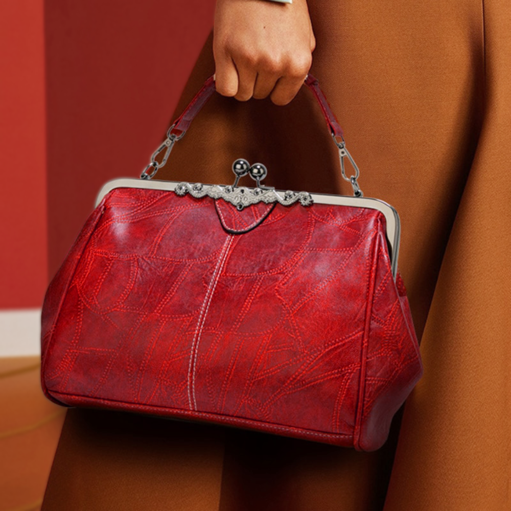 Diana · Borsa a mano con chiusura a scatto