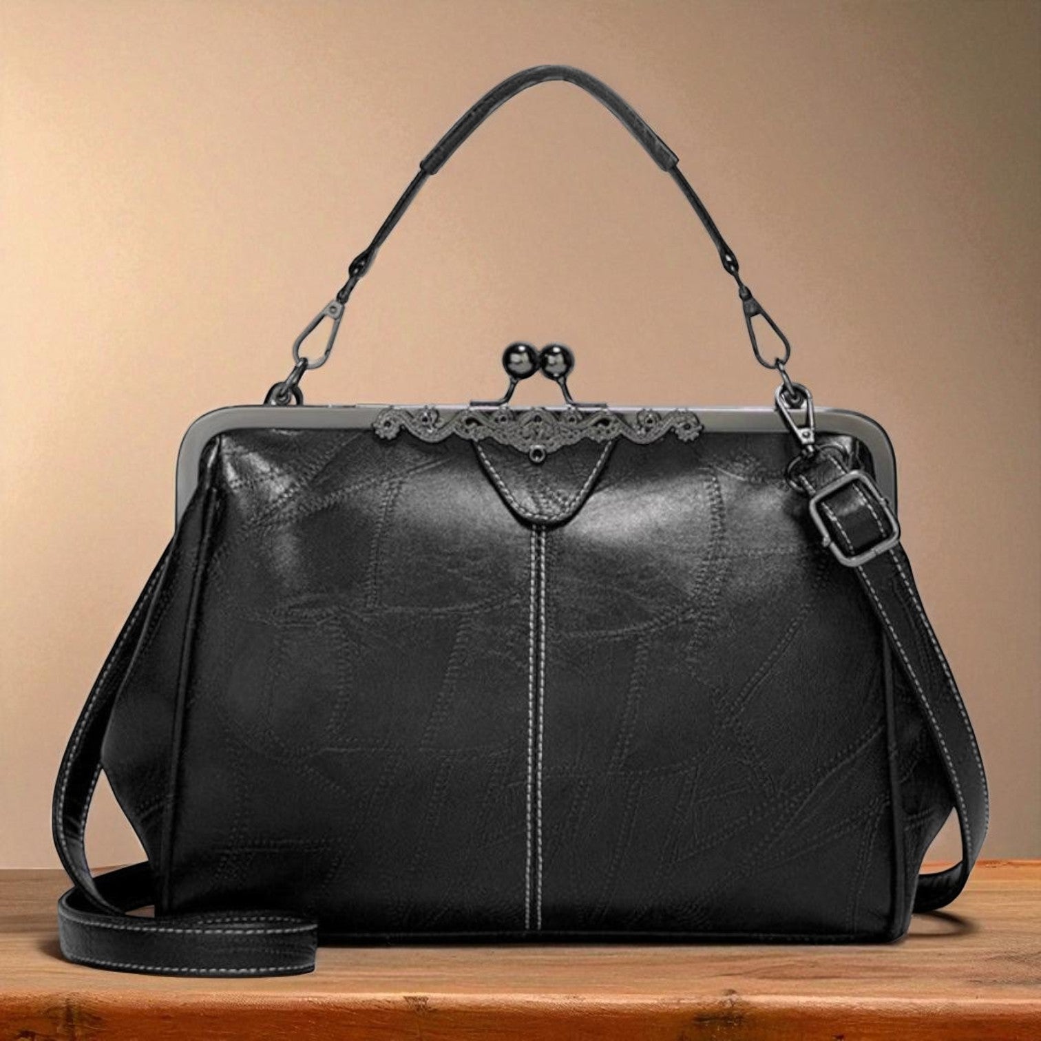 Diana · Borsa a mano con chiusura a scatto