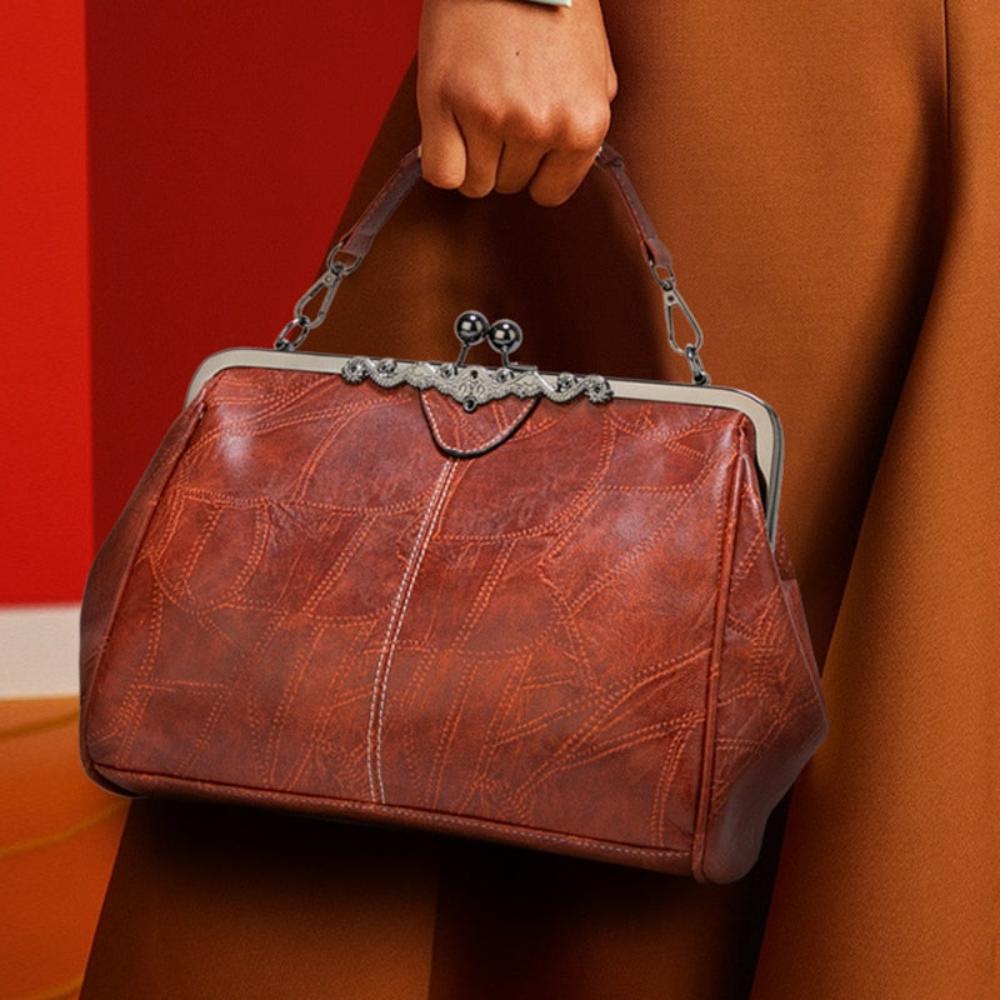 Diana · Borsa a mano con chiusura a scatto