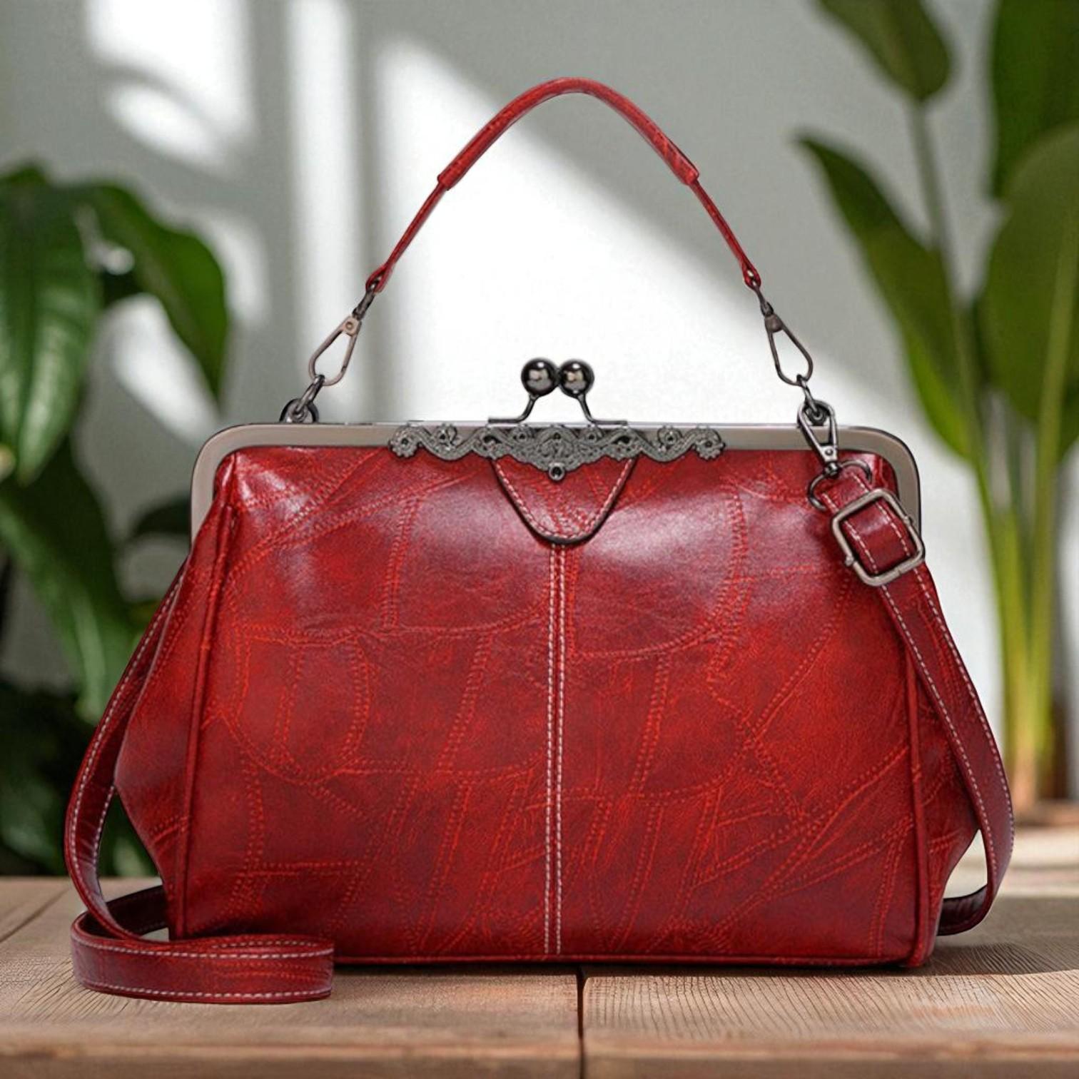 Diana · Borsa a mano con chiusura a scatto