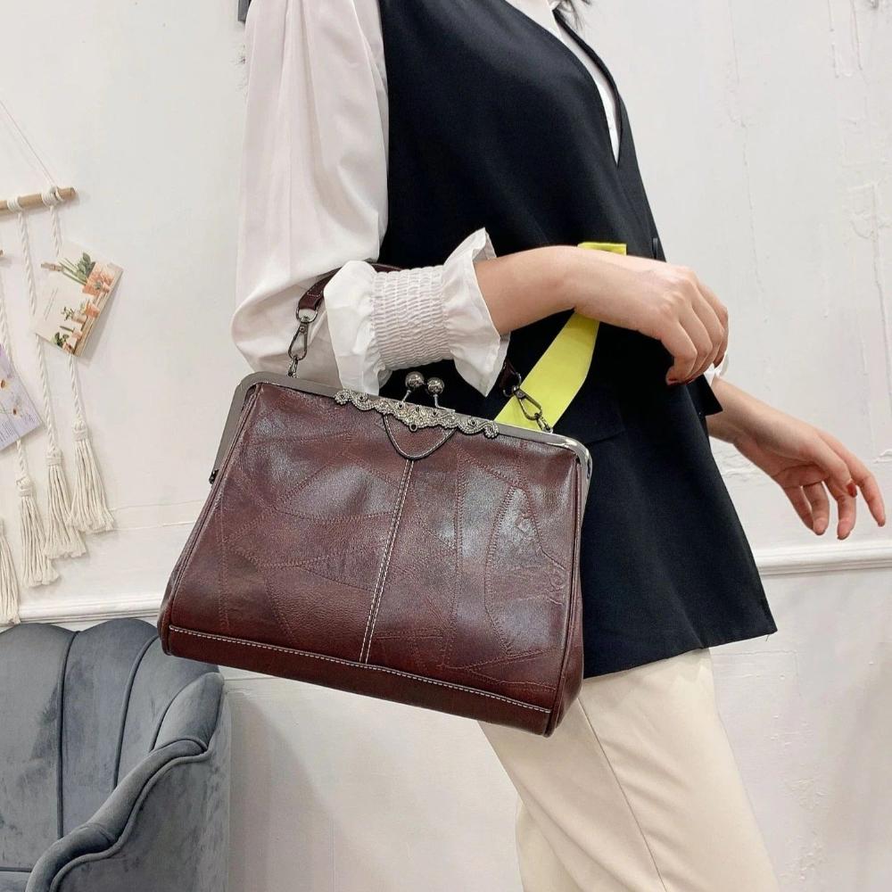 Diana · Borsa a mano con chiusura a scatto
